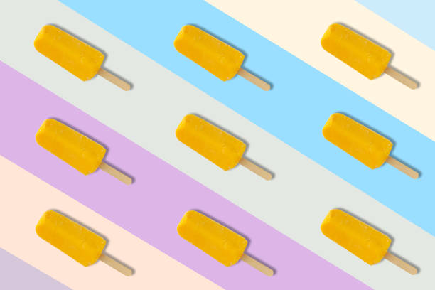 istock Yellow ice cream on colorful background. 1201607499