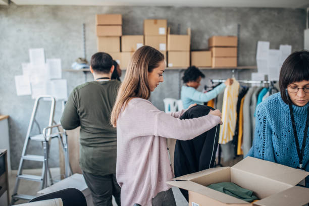 istock Diverse group of people arranging customers orders for drop shipping 1201610719
