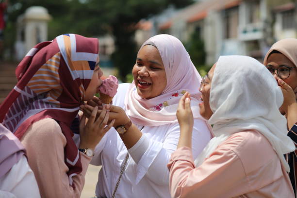 istock South East Asia: Modern Muslim Young Women 1201613455