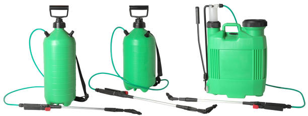 istock spraying fertilizers isolated 1201613998