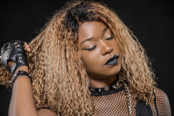istock Beautiful young black female posing for studio portrait 1201615177