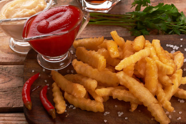 istock french fries on wooden table 1201616113