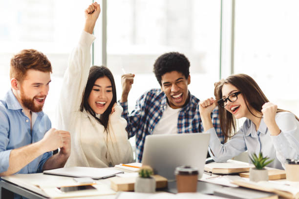 istock Yeah, exams passed. Emotional students expressing happines 1201618208