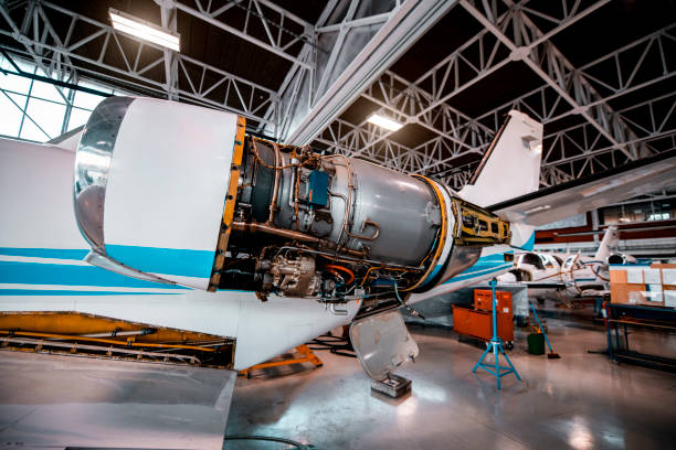 istock A jet engine of a small airplane with a maintenance panel removed in a repair hangar 1201618748