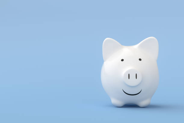 Happy White Piggy Bank on blue background Finance, Happy, Currency, Investment, Piggy Bank financial wellbeing stock pictures, royalty-free photos & images