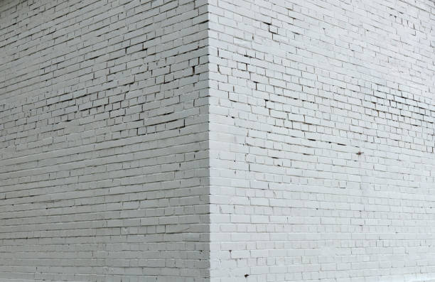 House corner House corner, Brick wall painted with white paint. alcove stock pictures, royalty-free photos & images