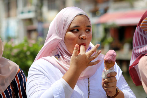 istock South East Asia: Modern Muslim Young Women 1201621602