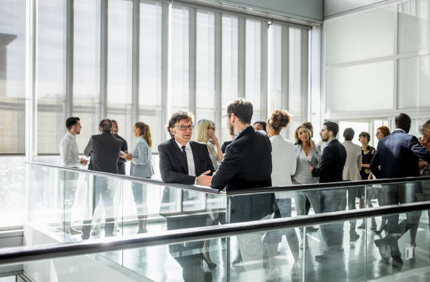 istock Business people at a conference event 1201622763