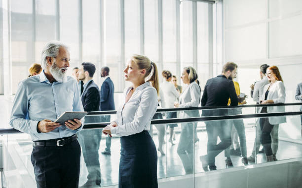 istock Business people at a conference event 1201624085