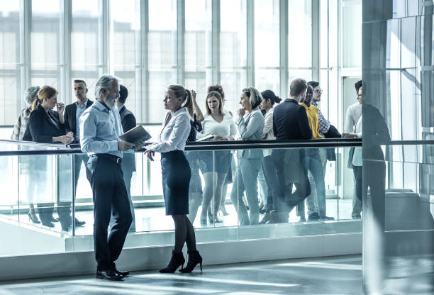 istock Business people at a conference event 1201624240