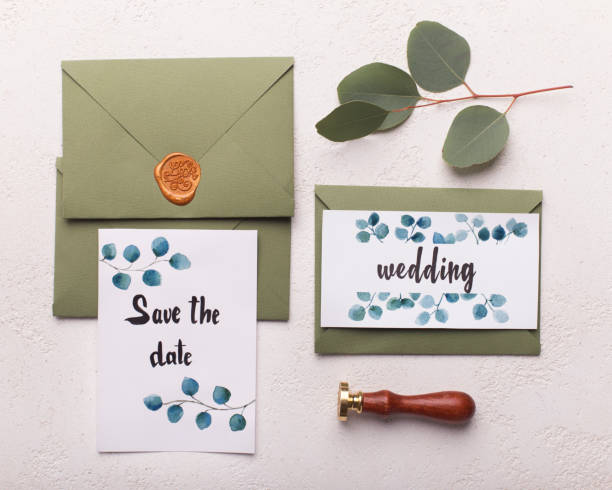 istock Cards Papers Lying on Table Decorate With Leaves 1201626156