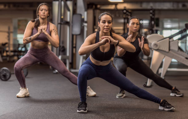 istock Three mixed race female friends in the Gym 1201627533