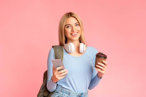 istock Teenager with headphones and backpack at studio 1201632935