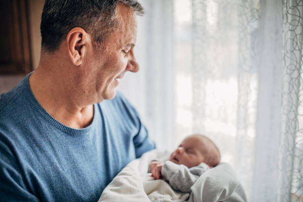 istock Grandpapa holding his grandson 1201633775