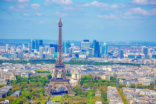 A black and white photo of the Eiffel Tower and part of Paris