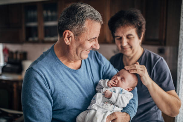 Grandparents spending day with their newborn grandchild