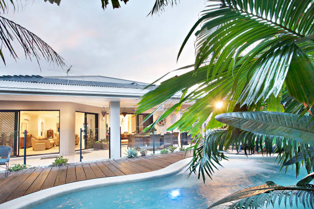 istock Luxury swimming pool near modern apartment 1201636795
