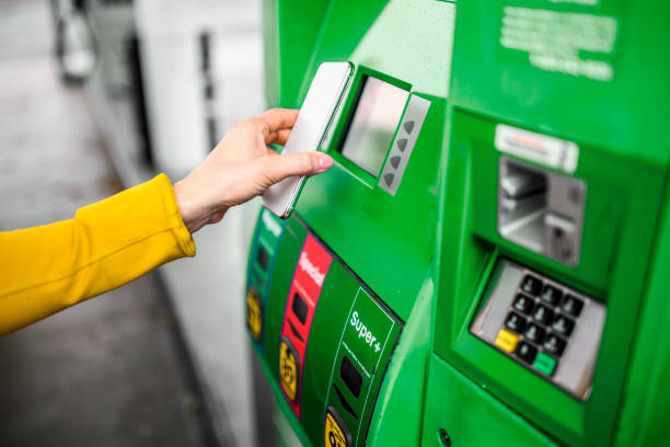 istock Paying for gas at a gas station 1201641500