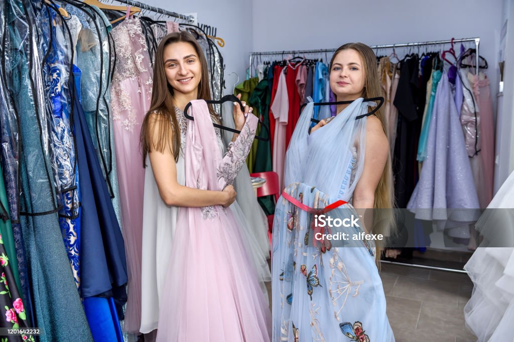 Young Ladies Have Chosen Dresses In Store Stock Photo - Download Image Now  - Adult, Adults Only, Beautiful People - iStock