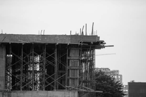bâtiment en construction - concrete wall flash photos et images de collection
