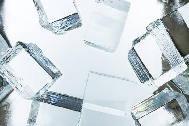 istock top view of transparent clear square ice cubes on mirror 1201645236