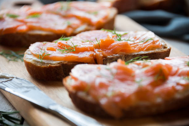 istock Sandwiches with smoked salmon and creamy cheese on bread 1201645369