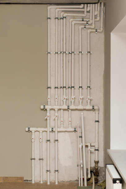 istock clean line white water pipes watering system pipe engineer design in underground. plastic white pipe heating manifold 1201646338
