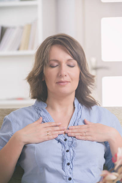 istock Woman practicing energy medicine 1201646560
