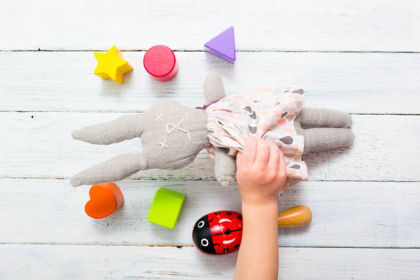 istock Baby hand and toys 1201646784