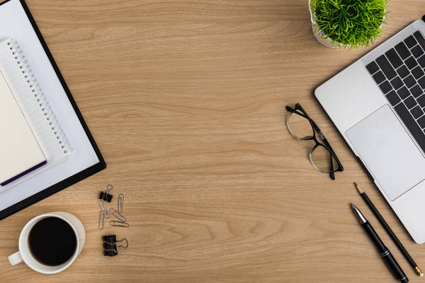 istock Top view Wood office desk table. Flat lay Workspace 1201647047