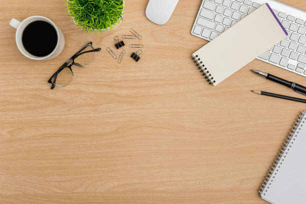 istock Top view Wood office desk table. Flat lay Workspace 1201648527