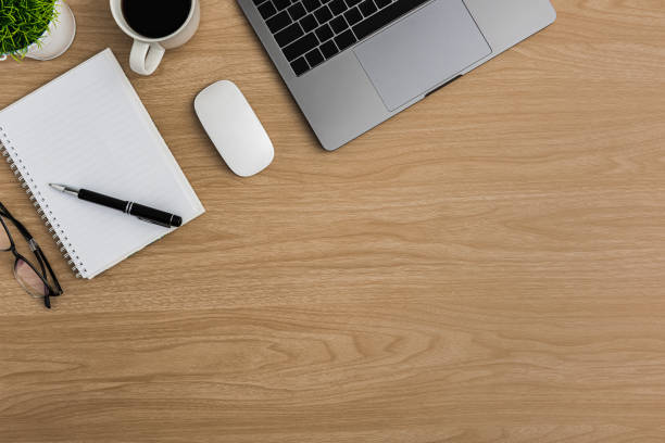 istock Top view Wood office desk table. Flat lay Workspace 1201648634