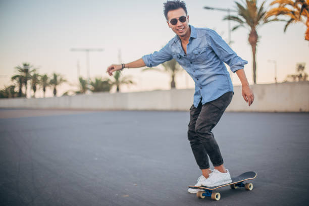 istock One man skateboarding on the street 1201648658