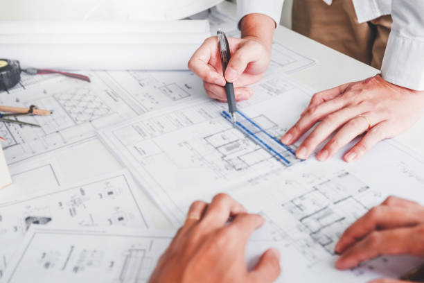 istock Team Engineer drawing graphic planning and meeting for architectural project on workplace 1201651088