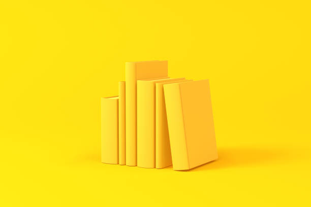 Books isolated over a yellow background. Minimalist concept.