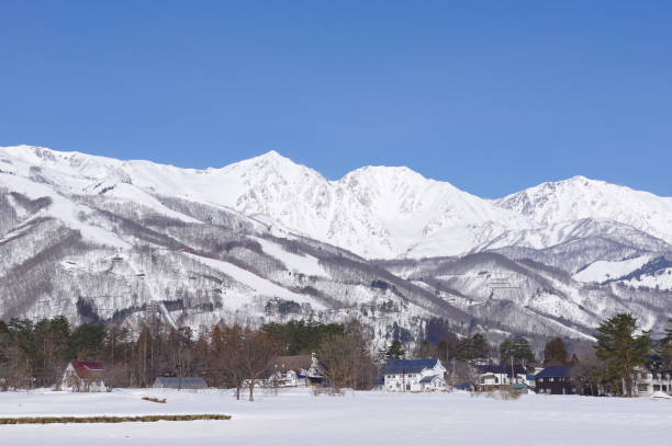 istock Hakuba village and Northern Alps with snow scenery 1201653761