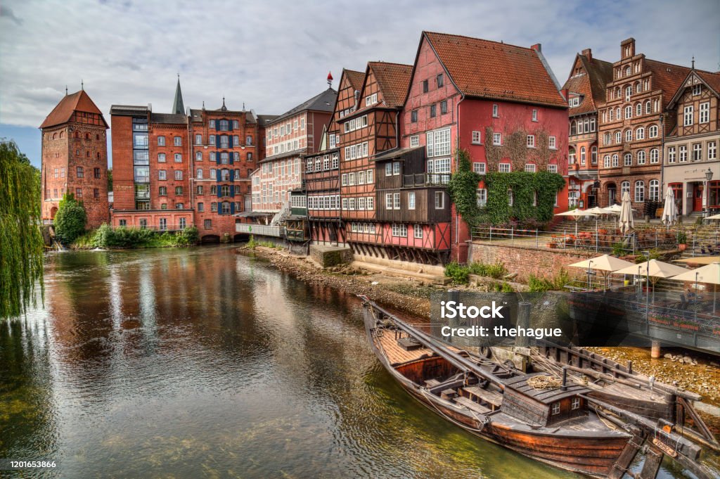Luneburger harbor in Luneburg, Germany Luneburg, Germany - July 4, 2019: Old Luneburger harbor with traditional houses and a historical boat in the old part of Luneburg, Germany on July 4, 2019 Lüneburg Stock Photo