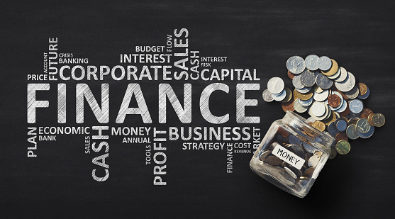 Finance Wordcloud With Money Savings In Jar Over Black Background. Financial Concept. Panorama