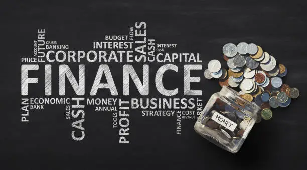 Photo of Finance Wordcloud With Money Savings In Jar, Black Background, Panorama