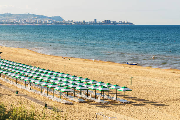Beach on the Black Sea coast with a view of the city of Anapa, Russia Beach on the Black Sea coast with a view of the city of Anapa, Russia krasnodar krai stock pictures, royalty-free photos & images