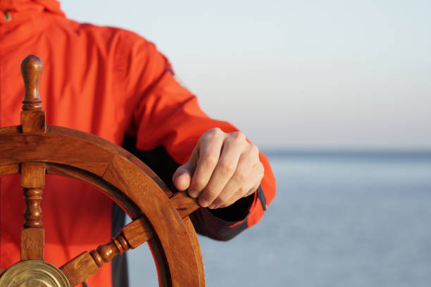 Hand on ship rudder. Hand on ship rudder. rudder stock pictures, royalty-free photos & images