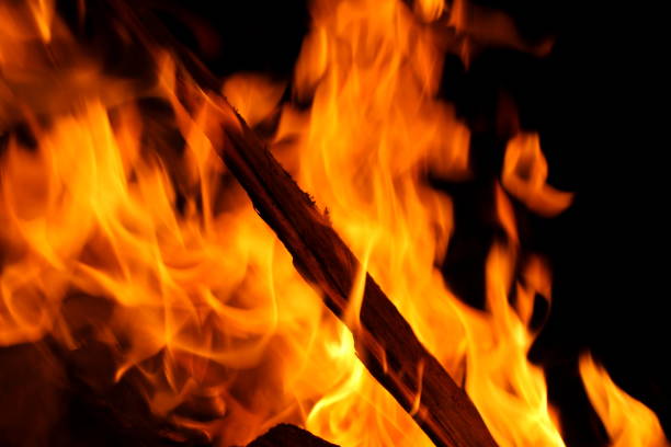 Pallets being used as fuel for a large bonfire
