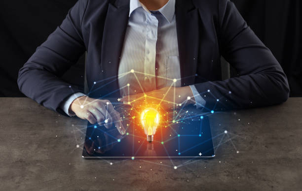 istock Business woman working on tablet with new idea concept 1201658972