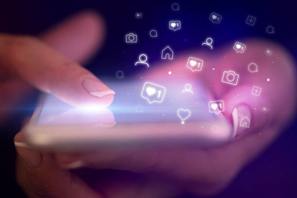 istock Finger touching phone with social media concept 1201659180
