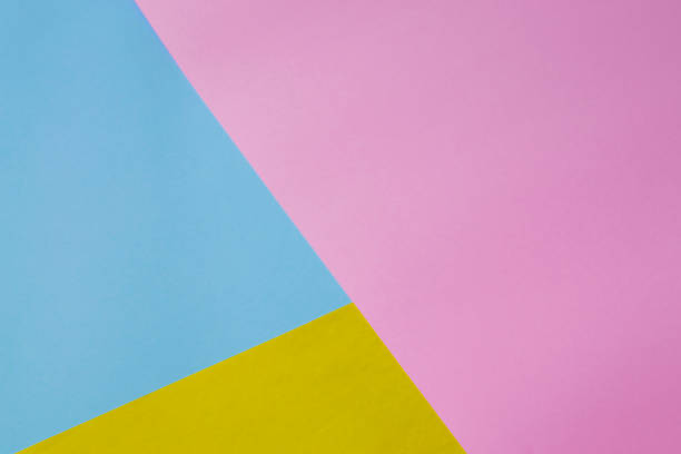 istock pastel background in yellow, pink and blue colors 1201660499
