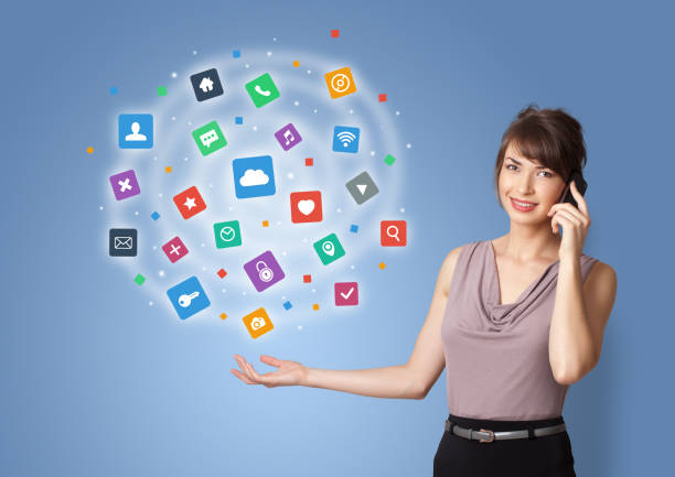 istock Person presenting new application icons and symbols 1201660987