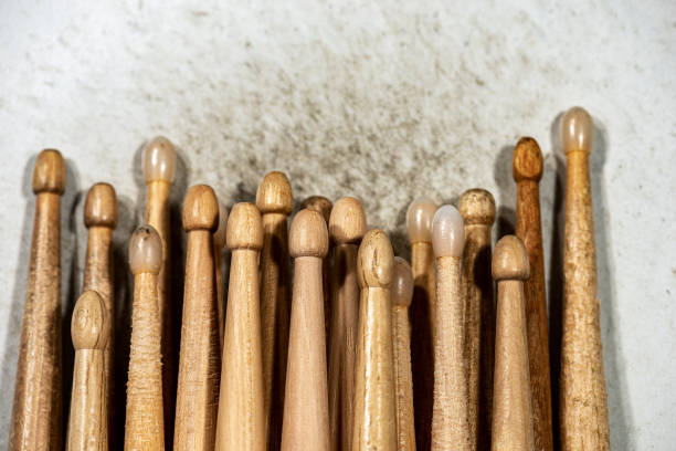 istock Many wooden drumsticks on an old snare drum - Percussion instrument 1201662335