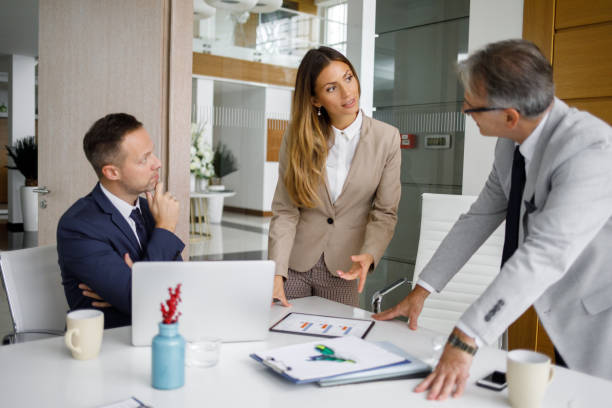 istock Senior manager and his staff analyzing the  business charts on digital tablet 1201663257