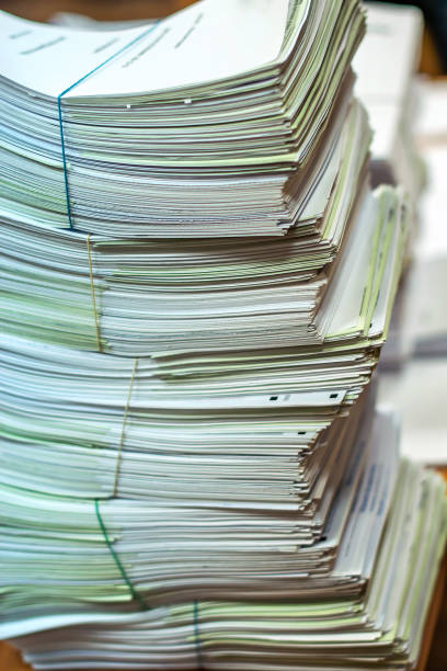 istock pile of paper documents in the office 1201664737