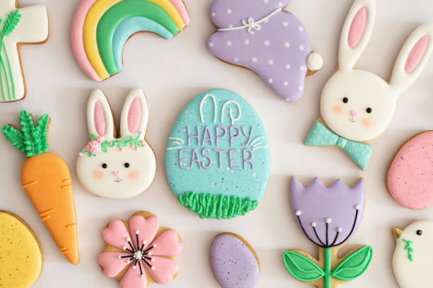 istock Happy Easter. Multicolored pastel easter cookies in a wicker basket  on a wood background 1201666804